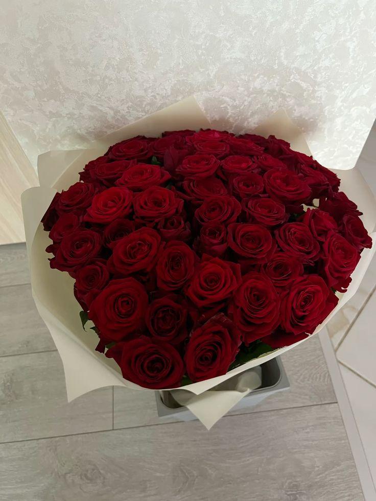 Corporate meeting room with carefully timed floral arrangements that maintain elegance throughout business hours